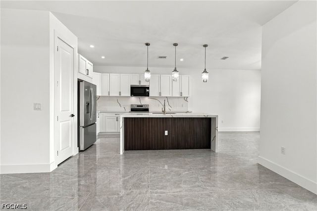 3900 25th ST SW, Lehigh Acres, FL 33976
