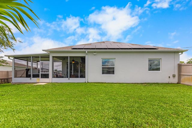 1502 SW Kosnar Avenue, Port St. Lucie, FL 34953