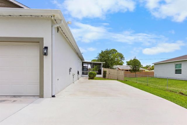 1502 SW Kosnar Avenue, Port St. Lucie, FL 34953