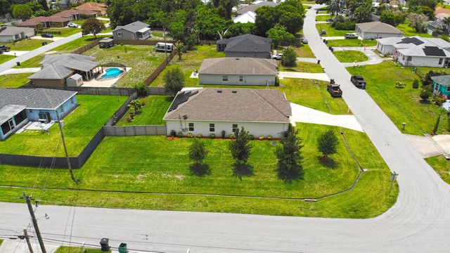 1502 SW Kosnar Avenue, Port St. Lucie, FL 34953