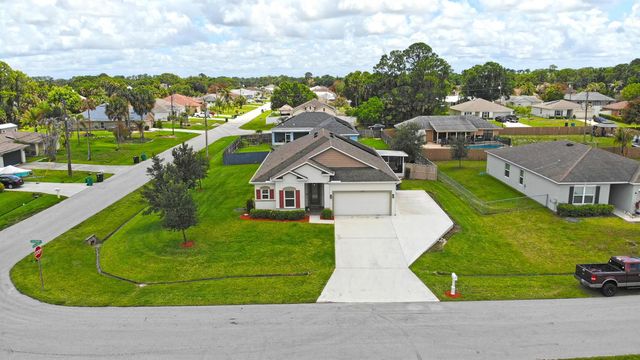 1502 SW Kosnar Avenue, Port St. Lucie, FL 34953