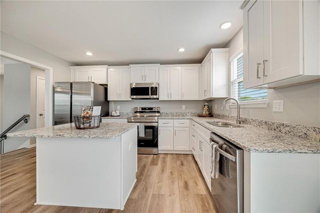 604 Wild Lupine Lane, Raymore, MO 64083