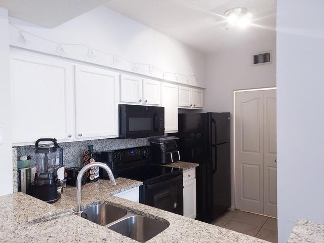 2204 Myrtlewood Circle E, Palm Beach Gardens, FL 33418