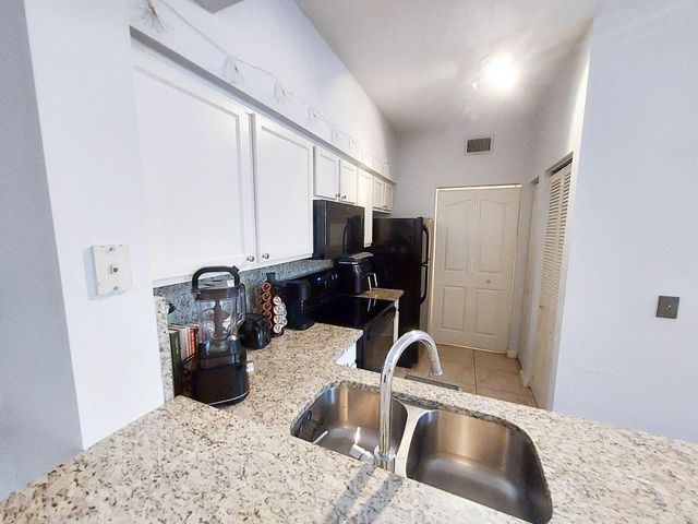 2204 Myrtlewood Circle E, Palm Beach Gardens, FL 33418