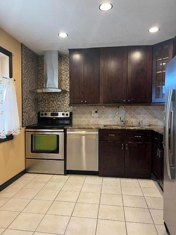 409 Golden River Drive, West Palm Beach, FL 33411