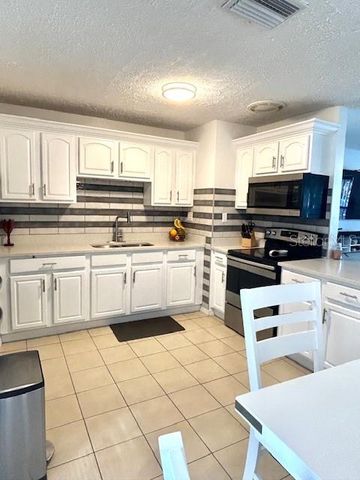 10418 N OTIS AVENUE, Tampa, FL 33612