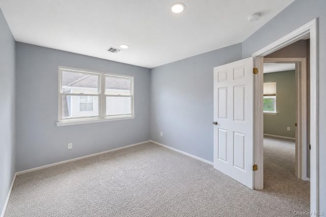 33 Peachtree Court, Holtsville, NY 11742