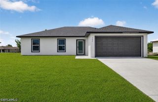 702 Carbon ST E, Lehigh Acres, FL 33974