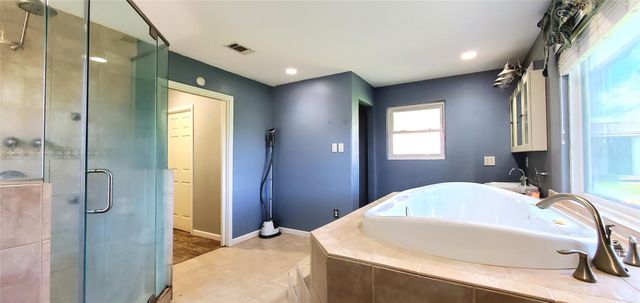 10108 Woodhollow Drive, Conroe, TX 77385