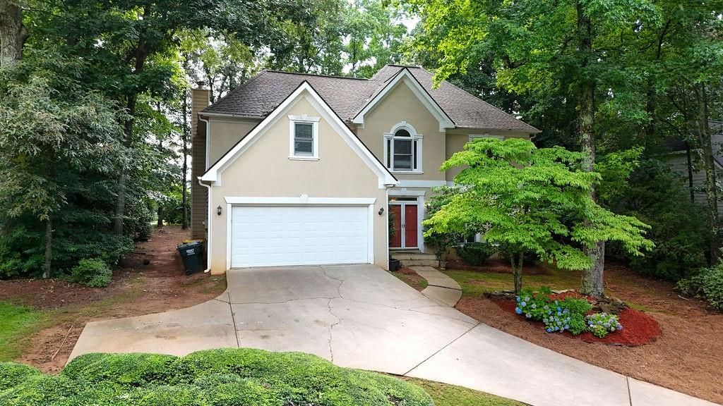 Image 1 of property listing at 140 Ashewoode Downs Lane, Alpharetta, GA 30005