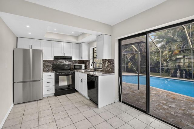 8968 SW 52nd Place, Cooper City, FL 33328