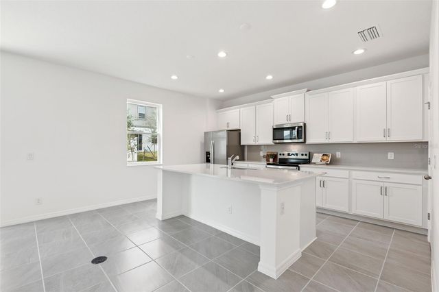 7028 ROLLING LEAF ROAD, Groveland, FL 34736