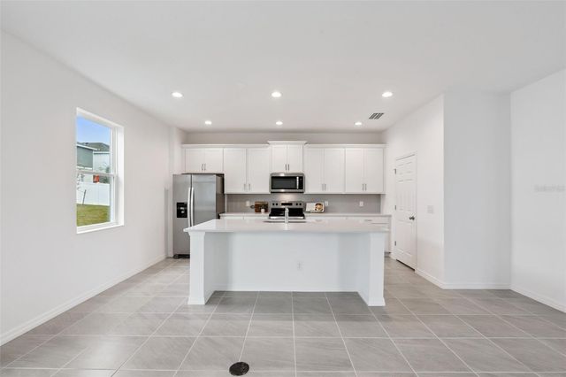 7028 ROLLING LEAF ROAD, Groveland, FL 34736