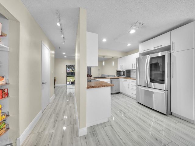 9867 Riverside Drive, Coral Springs, FL 33071