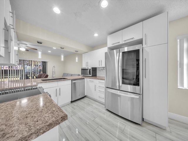 9867 Riverside Drive, Coral Springs, FL 33071
