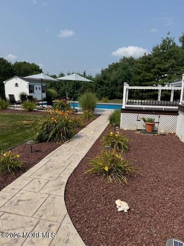 10 Turtle Hollow Drive, Manalapan, NJ 07726