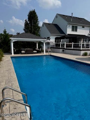 10 Turtle Hollow Drive, Manalapan, NJ 07726