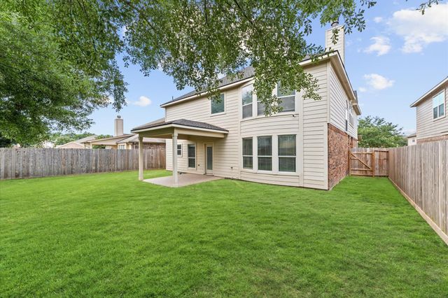 406 Oak Stream Drive, Conroe, TX 77304