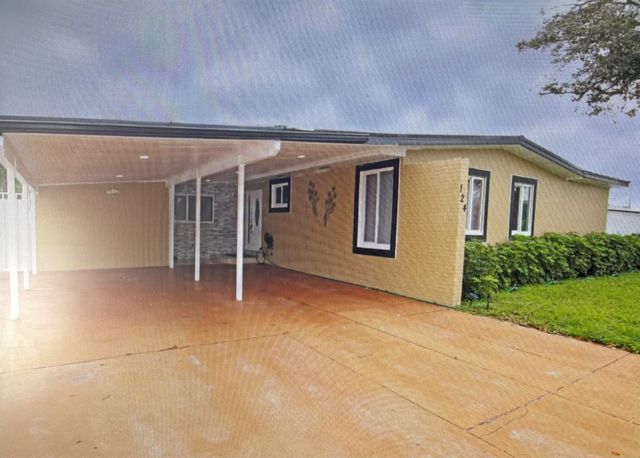 124 Davis Road, Palm Springs, FL 33461