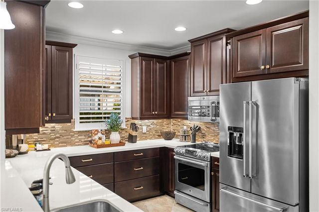 8760 Bellano CT 104, Naples, FL 34119