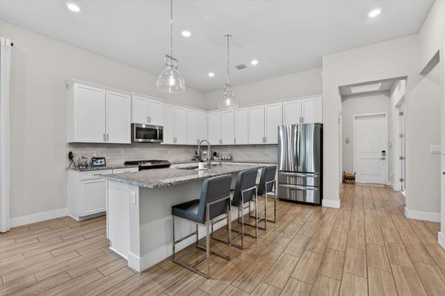 8427 W Blue Spring Drive, Parkland, FL 33067