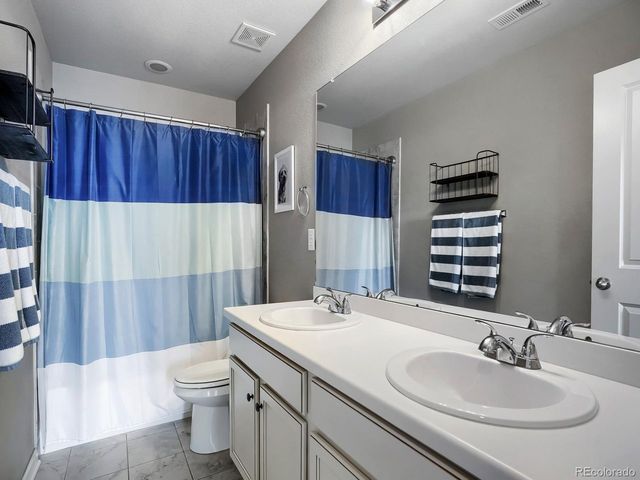 5226 Cherry Blossom Dr, Brighton, CO 80601
