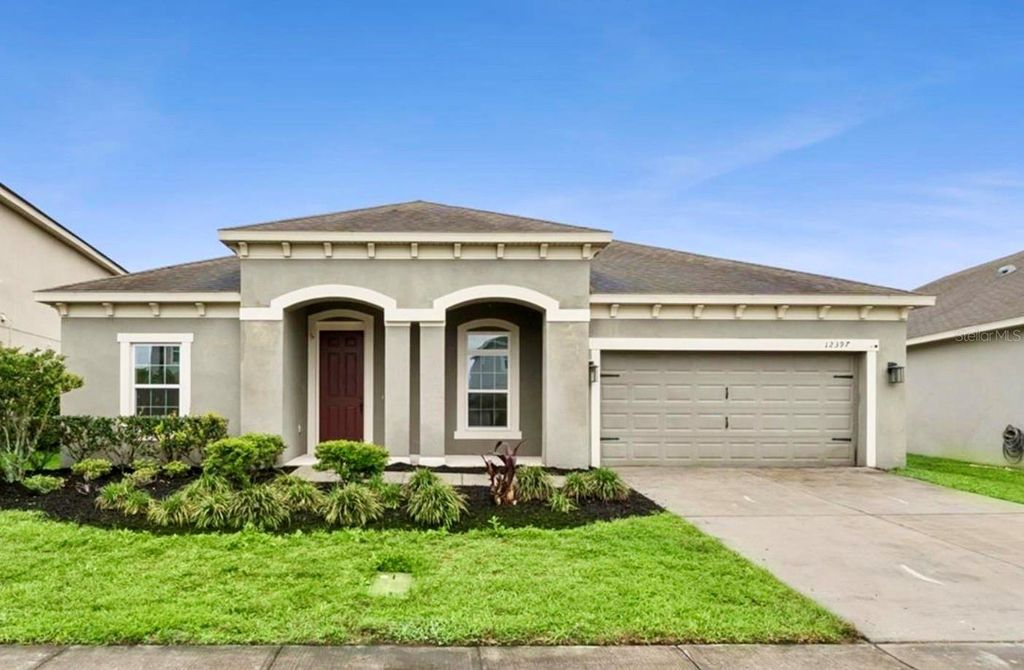 Image 1 of property listing at 12397 STONE BARK TRAIL, Orlando, FL 32824