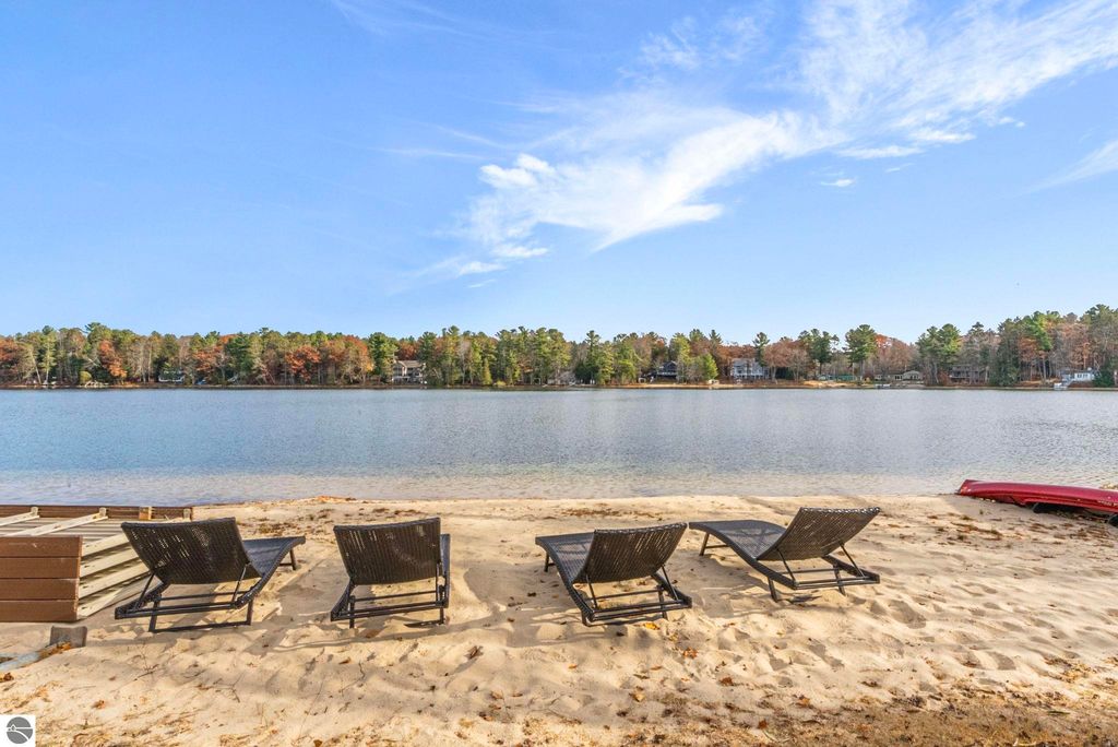 Image 1 of property listing at 7819 + 7811 Hillside Drive, Traverse City, MI 49685