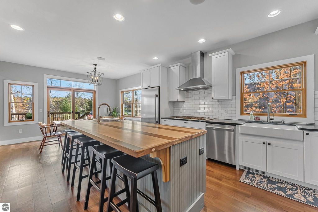 Image 3 of property listing at 7819 + 7811 Hillside Drive, Traverse City, MI 49685