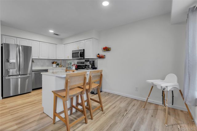 37 Whalers Cove 37, Babylon, NY 11702