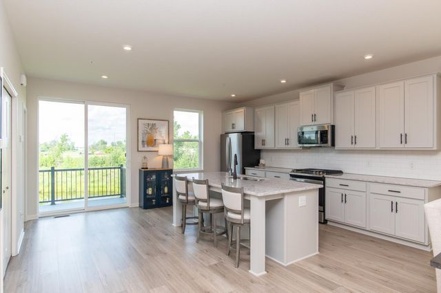 8658 London Circle NE E, Blaine, MN 55449