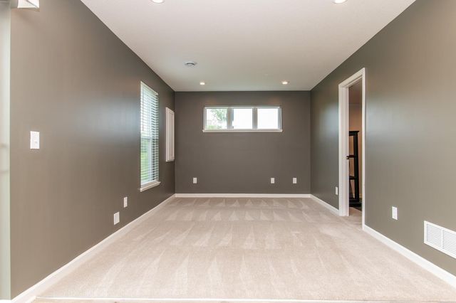 8658 London Circle NE E, Blaine, MN 55449