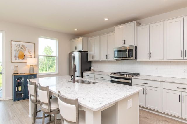 8658 London Circle NE E, Blaine, MN 55449
