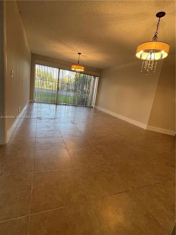 8801 Wiles Rd 108, Coral Springs, FL 33067