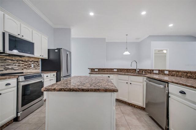 2106 THE OAKS BOULEVARD, Kissimmee, FL 34746