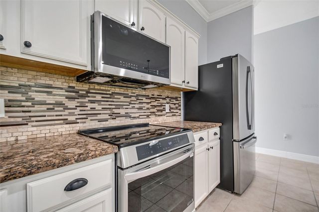 2106 THE OAKS BOULEVARD, Kissimmee, FL 34746