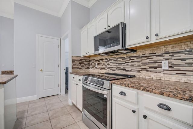 2106 THE OAKS BOULEVARD, Kissimmee, FL 34746