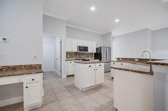 2106 THE OAKS BOULEVARD, Kissimmee, FL 34746