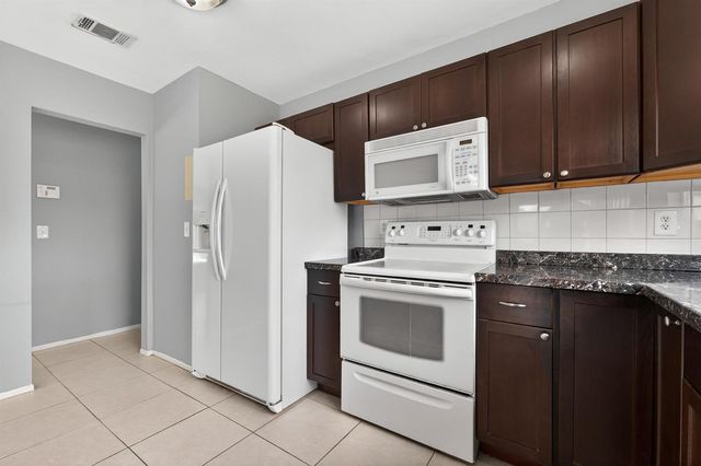 261 SW Cherryhill Road, Port St. Lucie, FL 34953