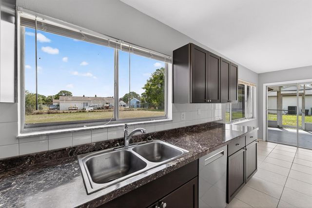 261 SW Cherryhill Road, Port St. Lucie, FL 34953