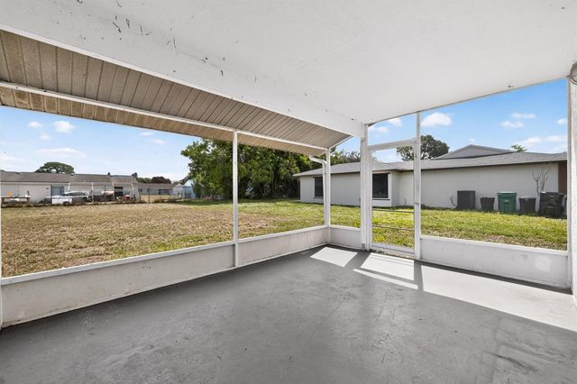 261 SW Cherryhill Road, Port St. Lucie, FL 34953