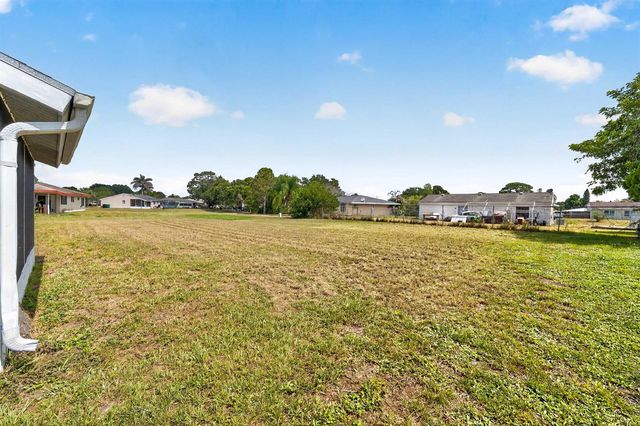 261 SW Cherryhill Road, Port St. Lucie, FL 34953