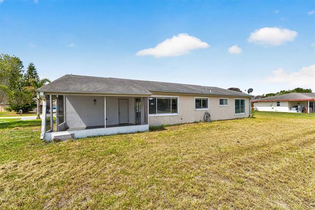 261 SW Cherryhill Road, Port St. Lucie, FL 34953