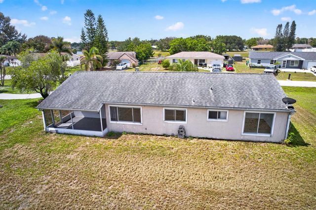 261 SW Cherryhill Road, Port St. Lucie, FL 34953