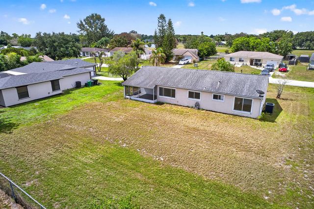 261 SW Cherryhill Road, Port St. Lucie, FL 34953