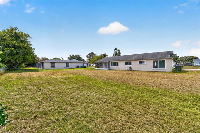 261 SW Cherryhill Road, Port St. Lucie, FL 34953