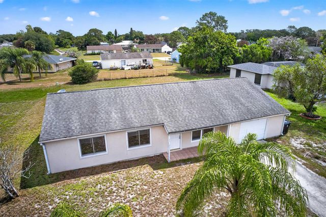 261 SW Cherryhill Road, Port St. Lucie, FL 34953
