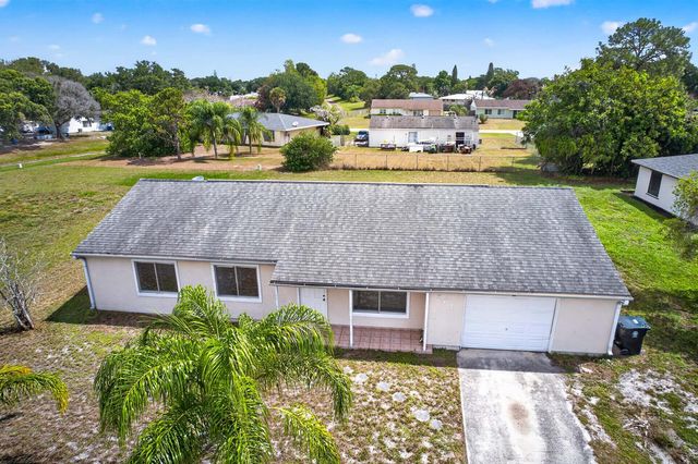 261 SW Cherryhill Road, Port St. Lucie, FL 34953