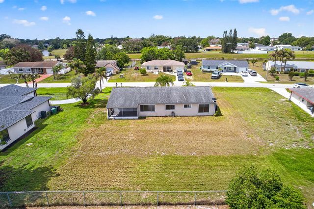 261 SW Cherryhill Road, Port St. Lucie, FL 34953