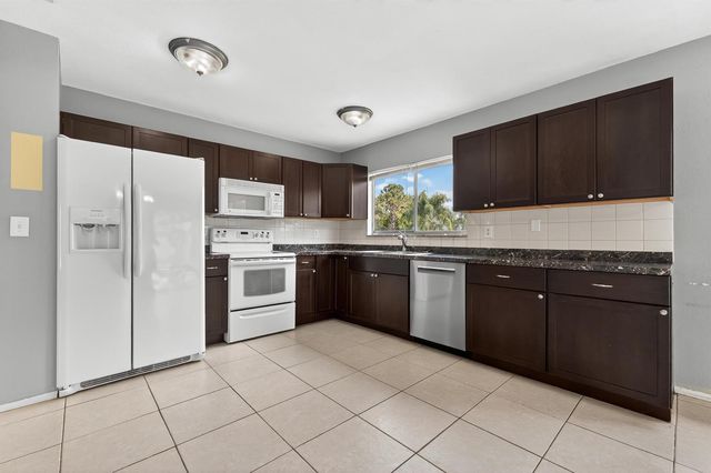 261 SW Cherryhill Road, Port St. Lucie, FL 34953